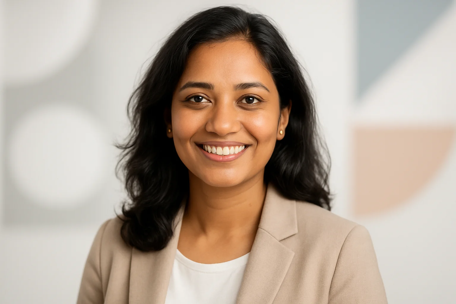 High-resolution portrait of smiling Bangladeshi woman in smart casual outfit